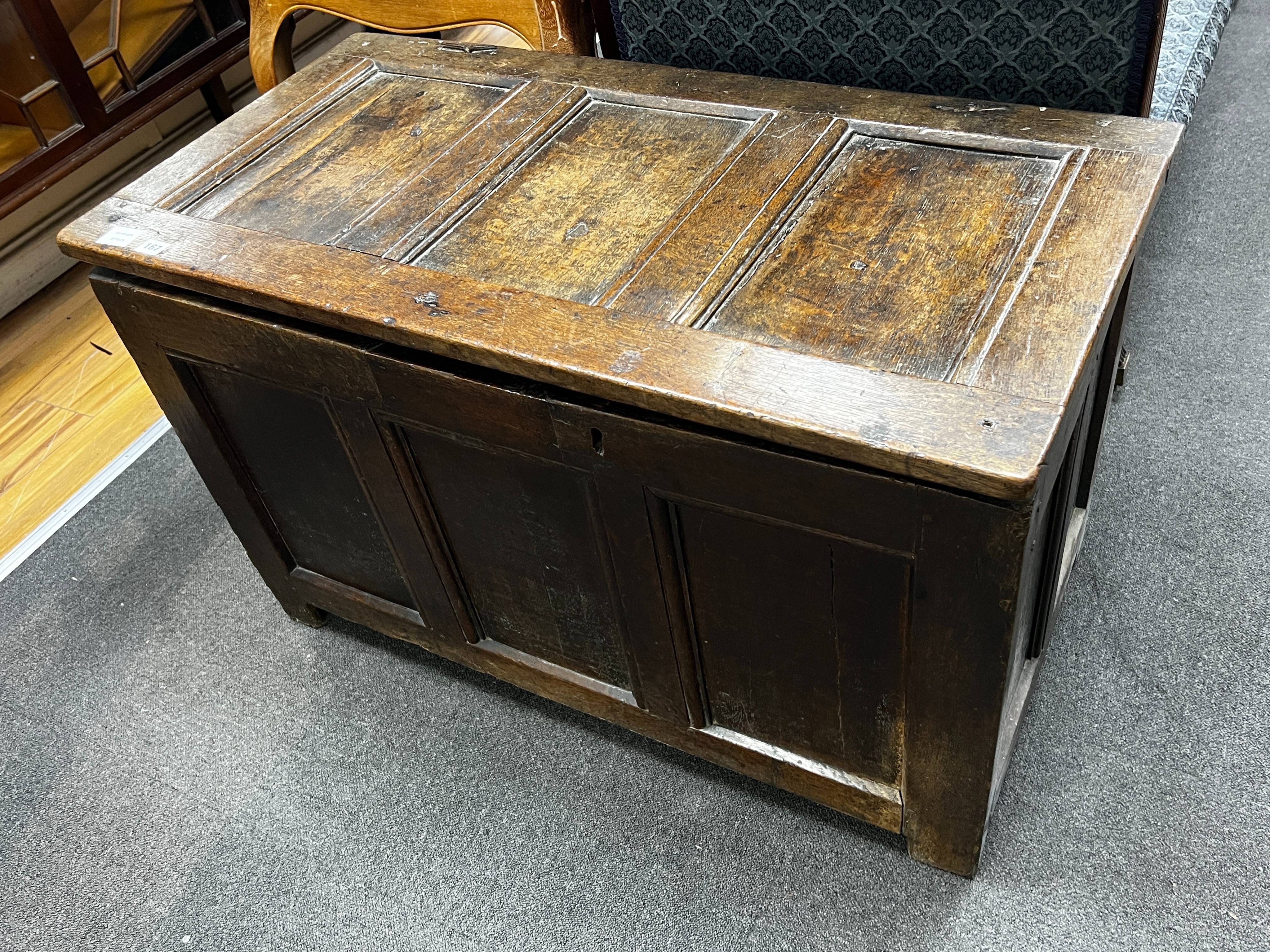 An 18th century panelled oak coffer, length 103cm, depth 53cm, height 64cm